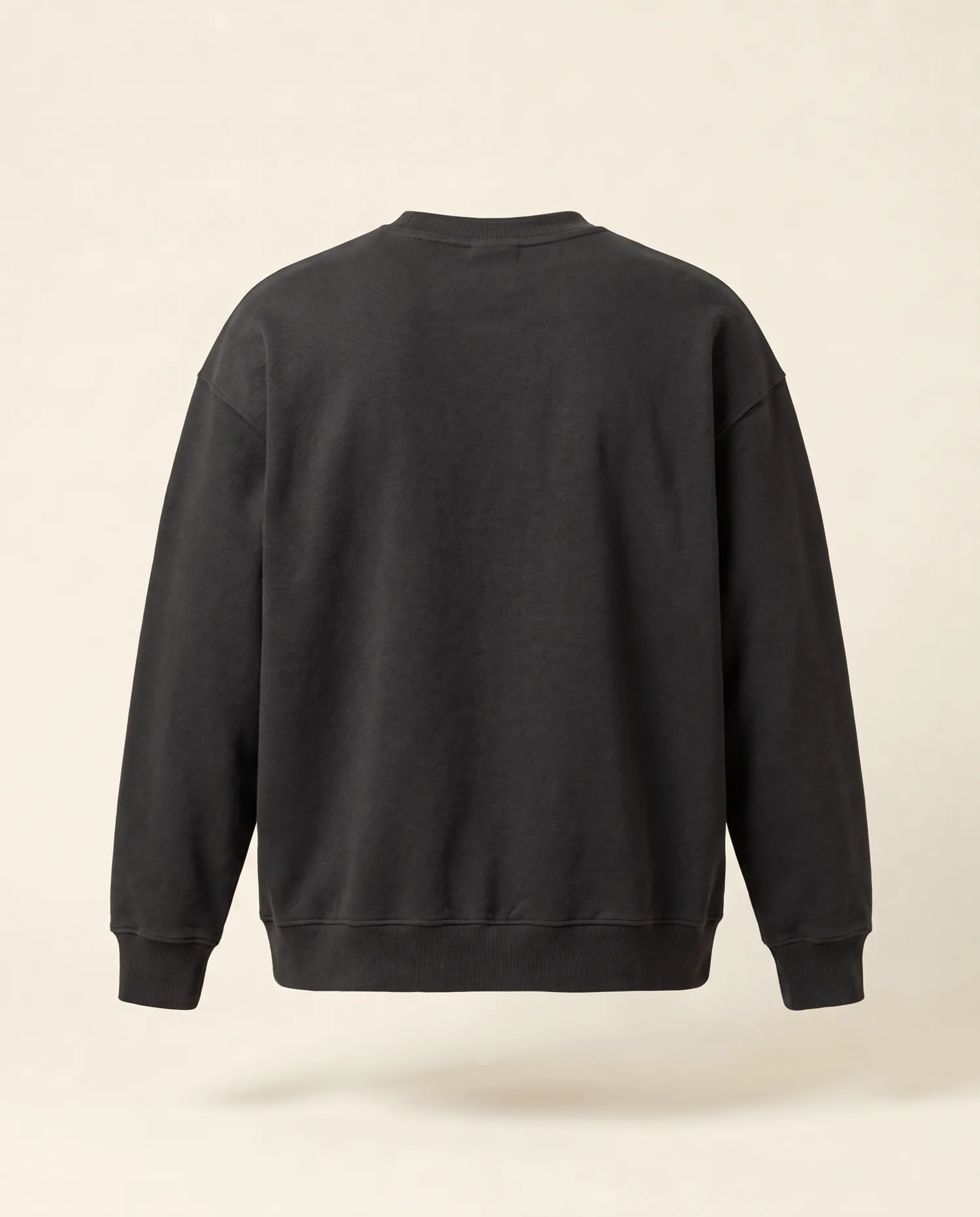 A Crewneck in Charcoal with Cele across the back