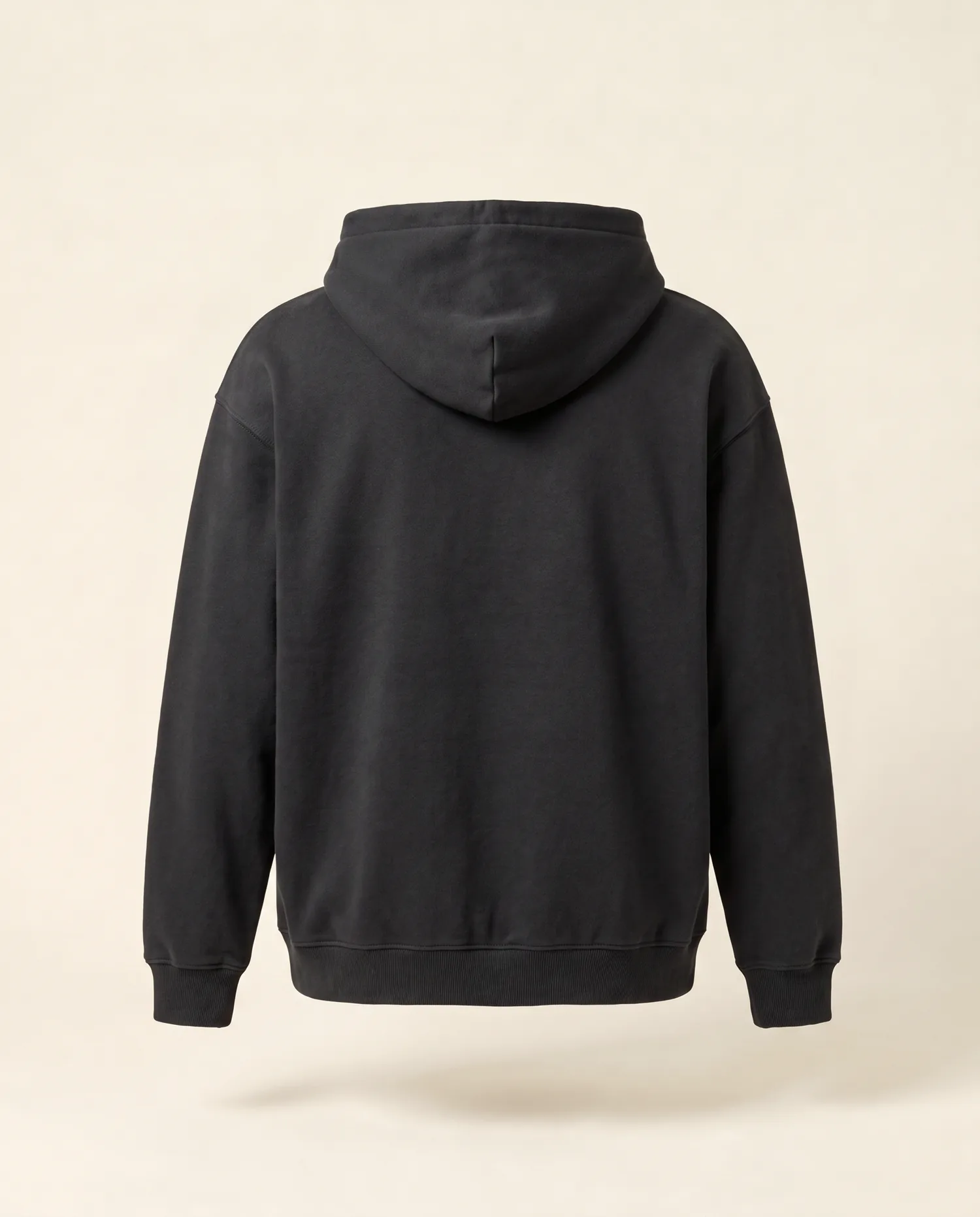 A Hoodie in Charcoal with Tahuri across the back