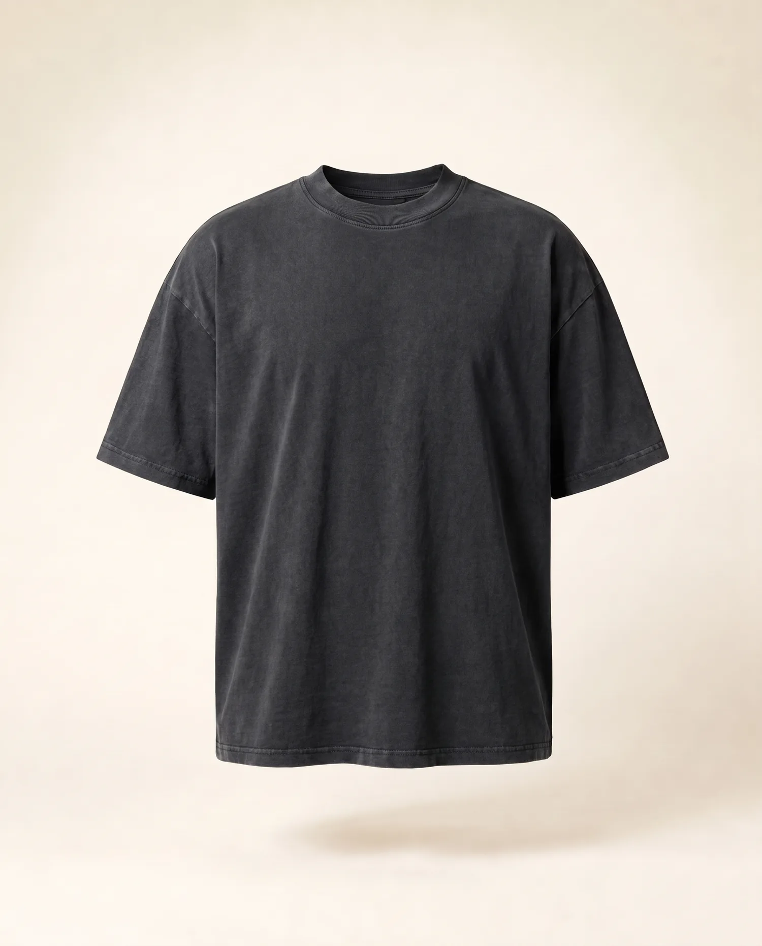 A Tee in Charcoal with Tahuri across the back, front